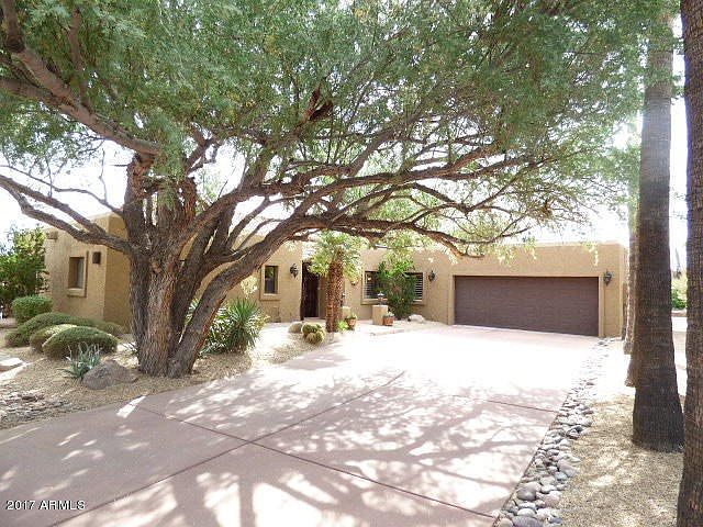 Mountain views, pool, golf course lot