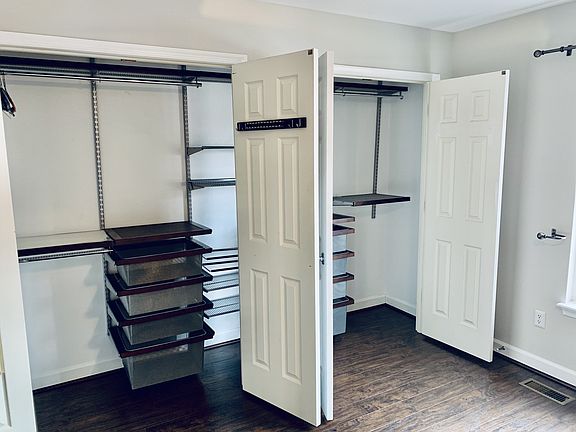 Custom closets in primary bedroom.