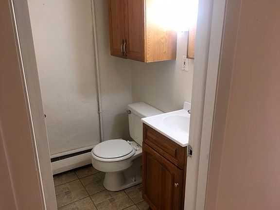 Bathroom is off the hall from kitchen to LR. 