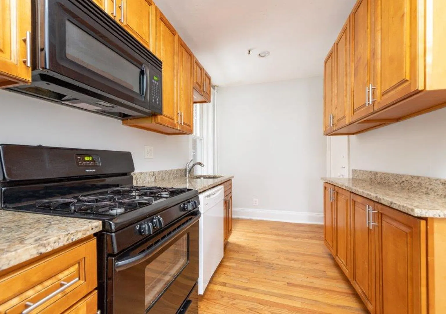 2BR with Heat & Hot Water Included | Steps to the B Line — Photo 3