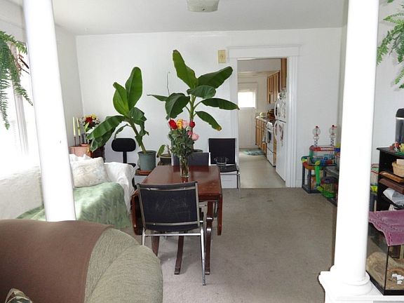 Dining area also has fir under the carpet. Terrific space with lots of light and windows.
