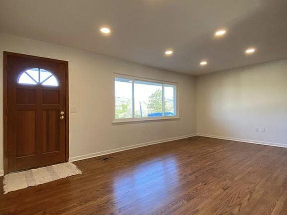 Gorgeous hardwood floors as you enter into this large living room