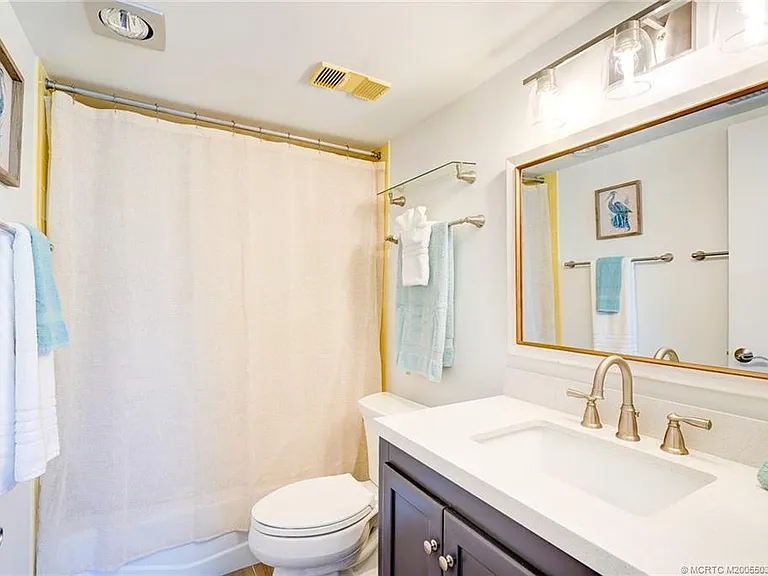 5553 NE Gulfstream Way — Photo 19