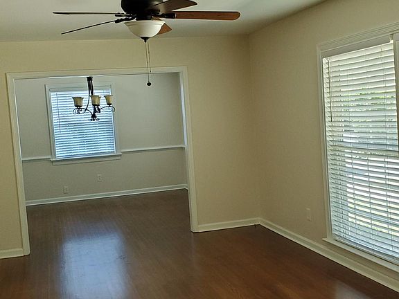Living Room w/ Entry Into Formal Dining Area