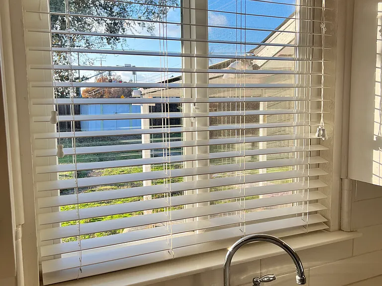 Kitchen sink with window looking to the backyard