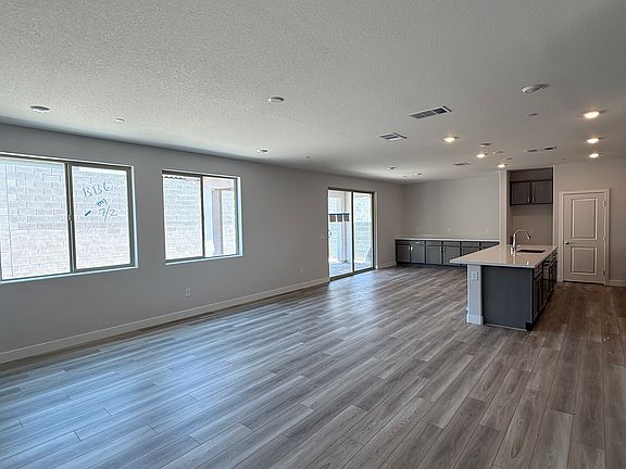 View from Living Room to Dining Room and Kitchen (Construction still in progress)