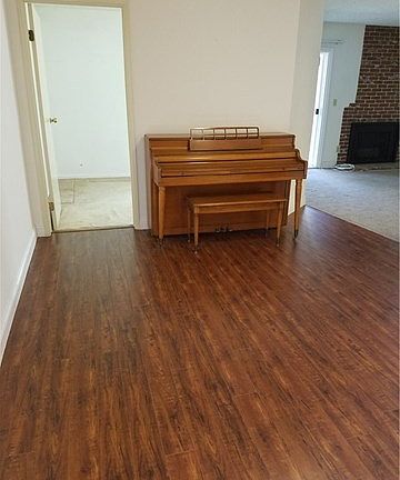 Dining area adjacent to kitchen and living room