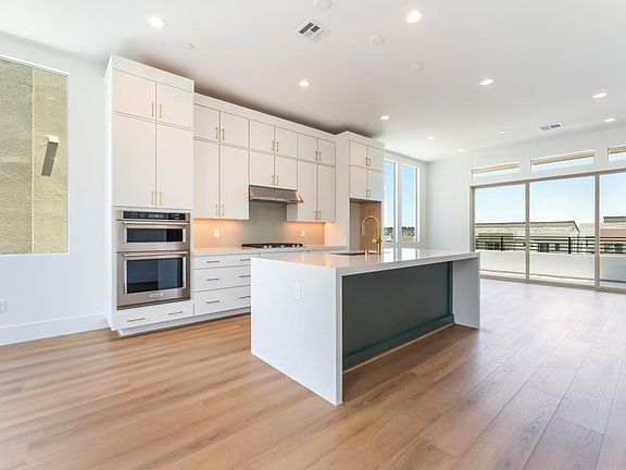 Gourmet kitchen with 42 upper and stacked cabinets