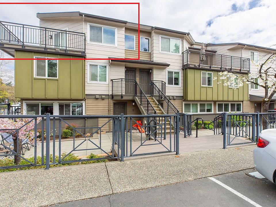 Exterior, unit is upper left hand side, living room deck pictured.