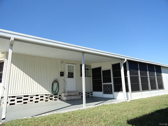 CARPORT/LANAI SIDE