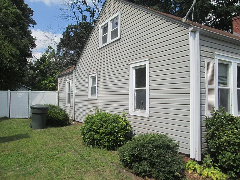 Side of house, to back yard