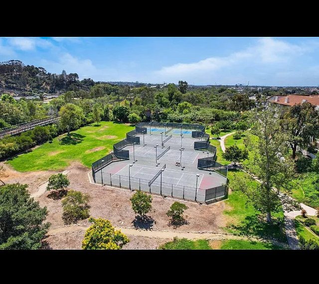 The property - greens, tennis courts, pickle ball court and rose garden.