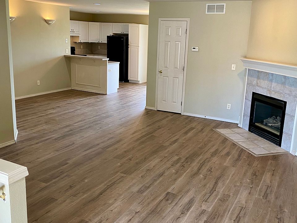 New Wood Floors and Carpet- This floor plan is perfect for privacy and creating your own space- 2nd Living Area and Bedroom in Viewout Basement