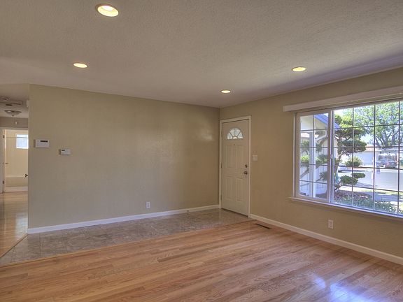 Entry and Living Room with Large Picture Window