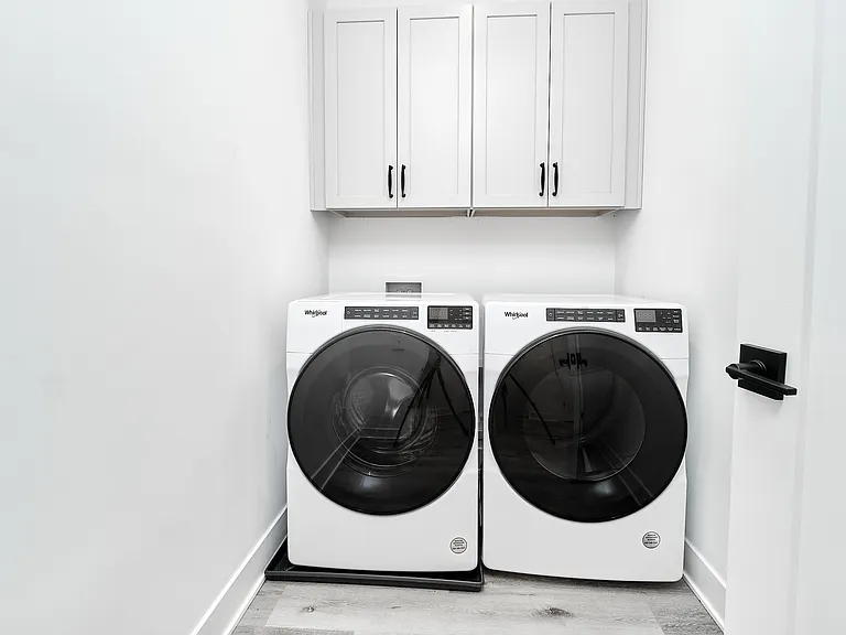 Laundry room near bedrooms