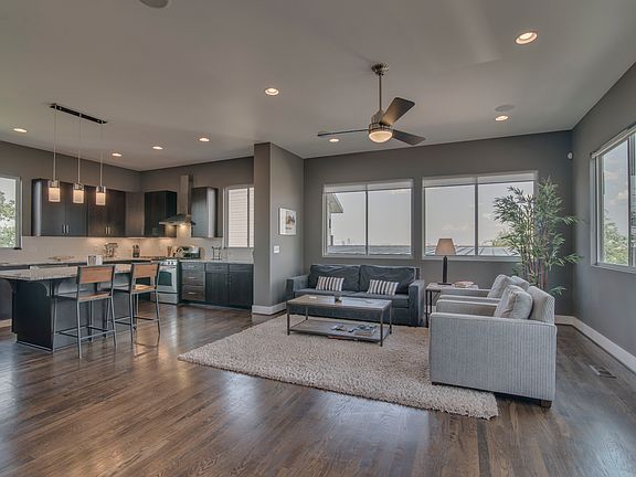 Living room opens to kitchen