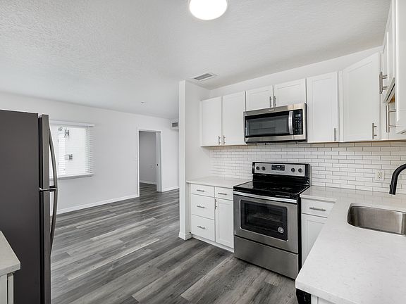 5th image of 4462 Burlington Ave N