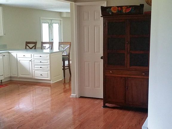 Long view of kitchen, dining-room.
