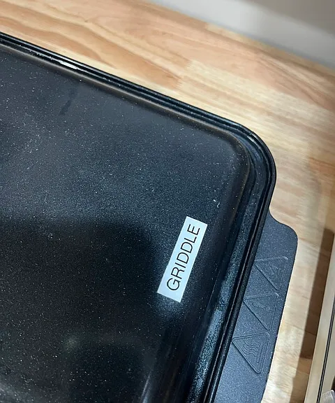 Griddle perfect for pancakes and just sits on top of the 2-burner cooktop.