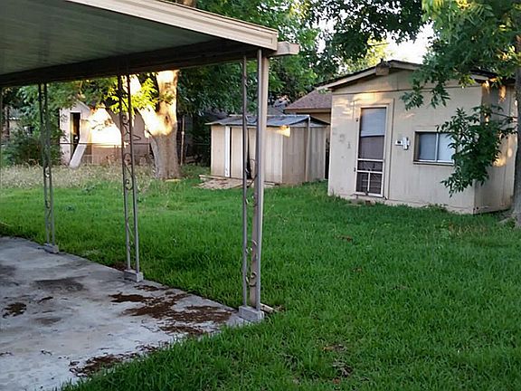 Ample yard space for growing family! Storage shed & extra 8 x 12 building for home office -equipped 