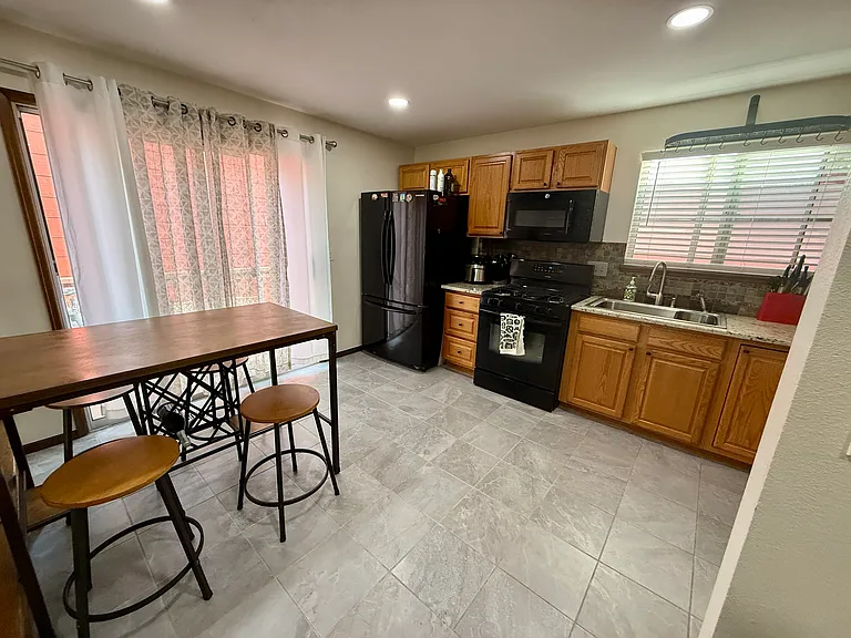 Kitchen: bright and open, lots of cabinet space, all working appliances, gas stove, butcher block counter