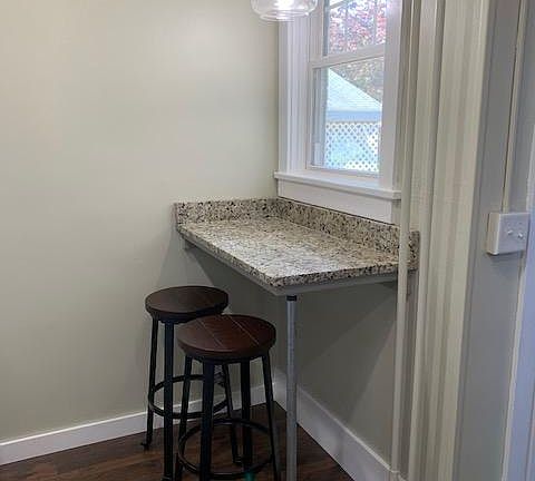 Kitchen bar-height eating area.