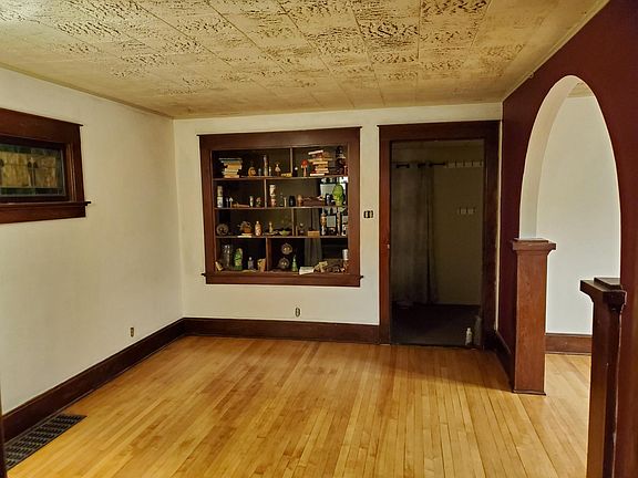 Living Room with Beautiful Hardwood and 4 season Porch