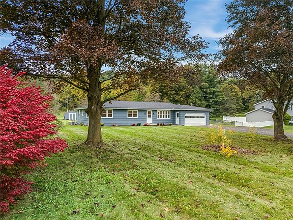 3rd image of 6933 E River Rd