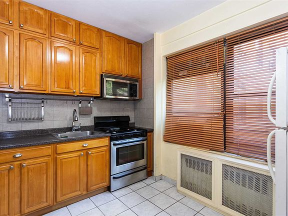 2nd image of 64-34 102nd St APT 1R