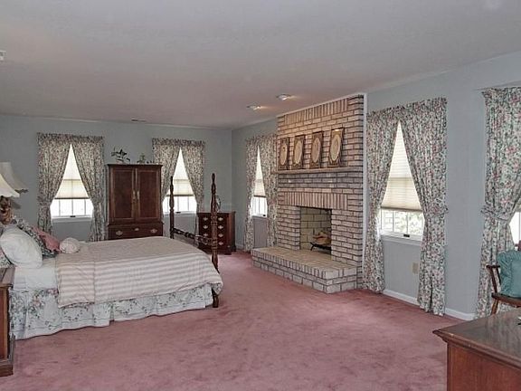 Master Bedroom - Features Hardwood Floors & Ceiling Fan.