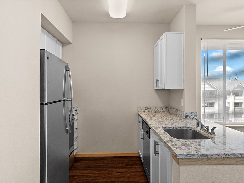 A sleek kitchen with updated finishes and bright natural light.