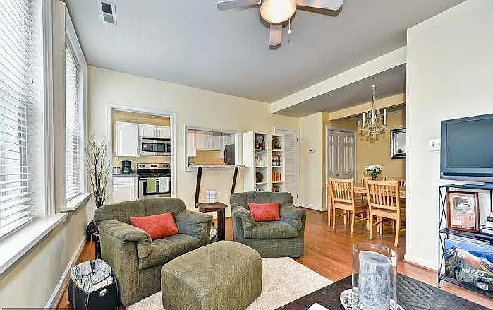 Living room and dining area, with view into kitchen