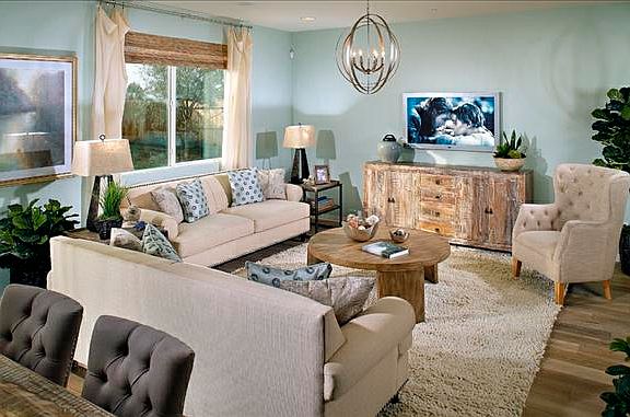 Spacious living room with sofa and chairs