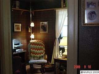 one of two bedrooms on main floor - two more upstairs - den in basement