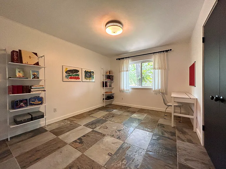 4th Bedroom, adjacent to kitchen.