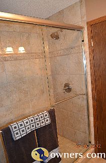Master bath - tiled shower w/glass sliding doors