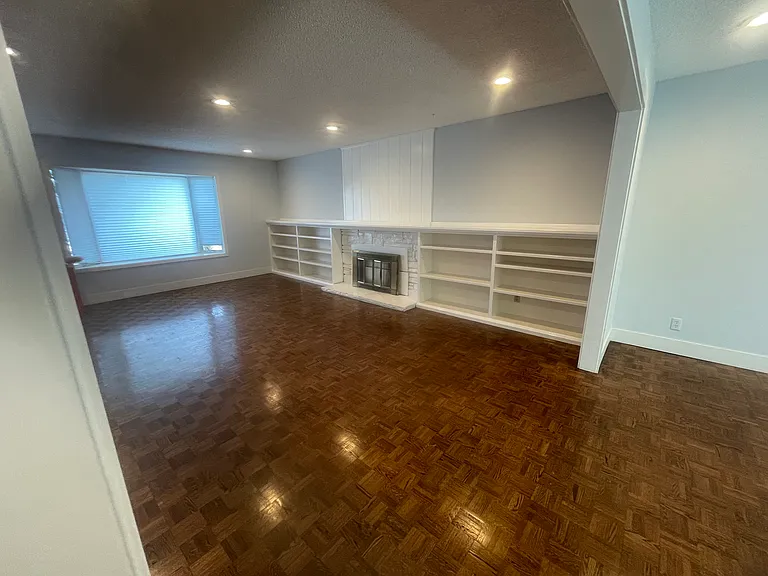 Living room with custom shelves