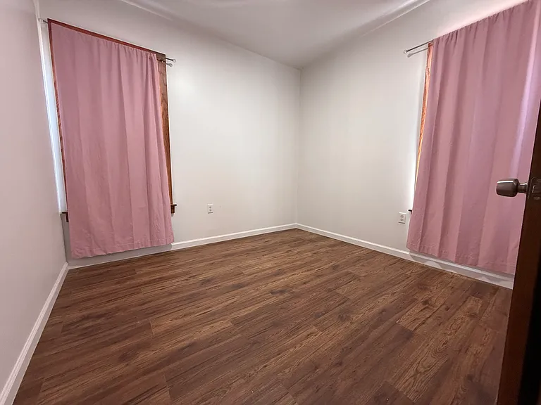 Bedroom 1 - 2 closets and 2 windows