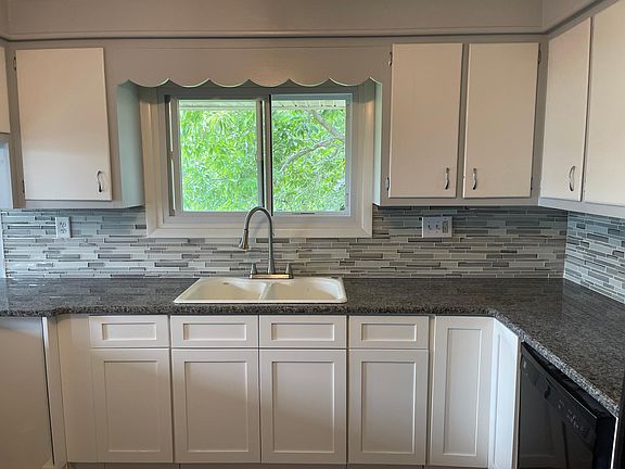 Kitchen with granite countertops