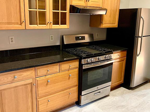 New granite countertops + flooring.
