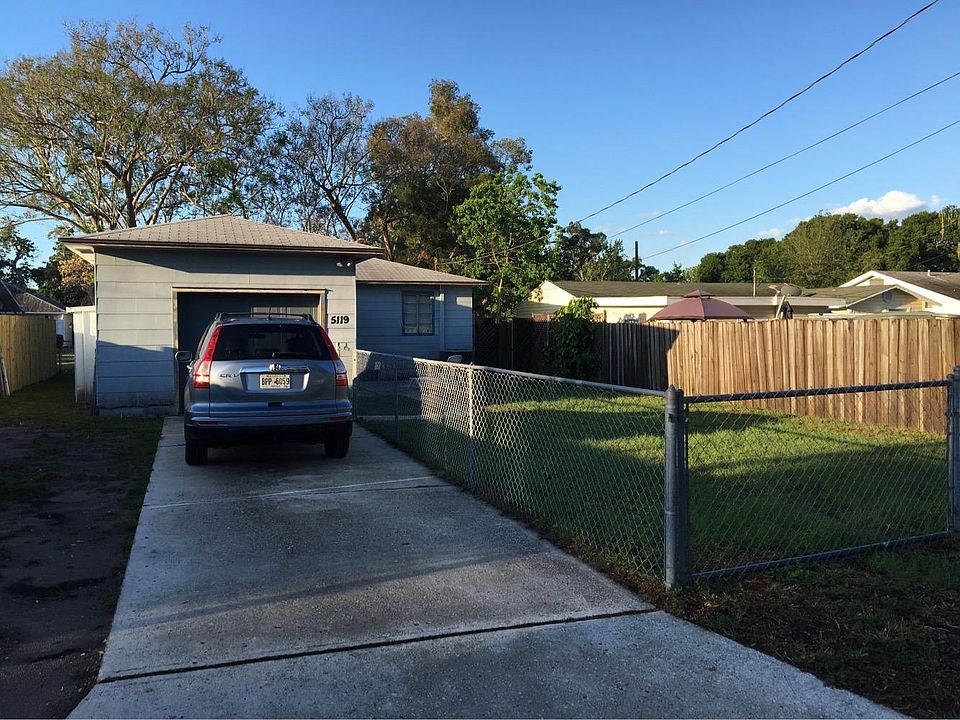 Alley access with concrete driveway.  