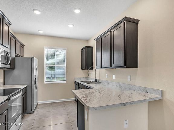 2nd image of 448 Running Woods St #1