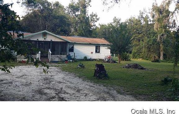 3rd image of 607 NW 100th St