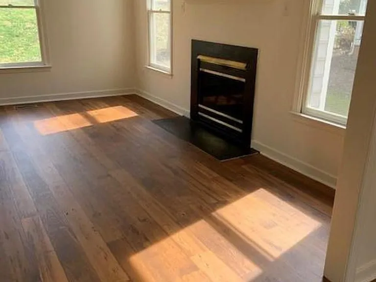 LVP flooring, gas fireplace, mantle