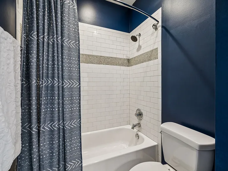 Full bath on floor 2 with shower/tub combo.