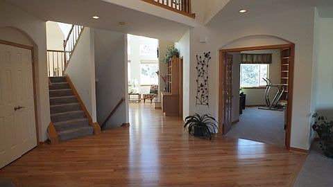 Two story entry with hardwoods
