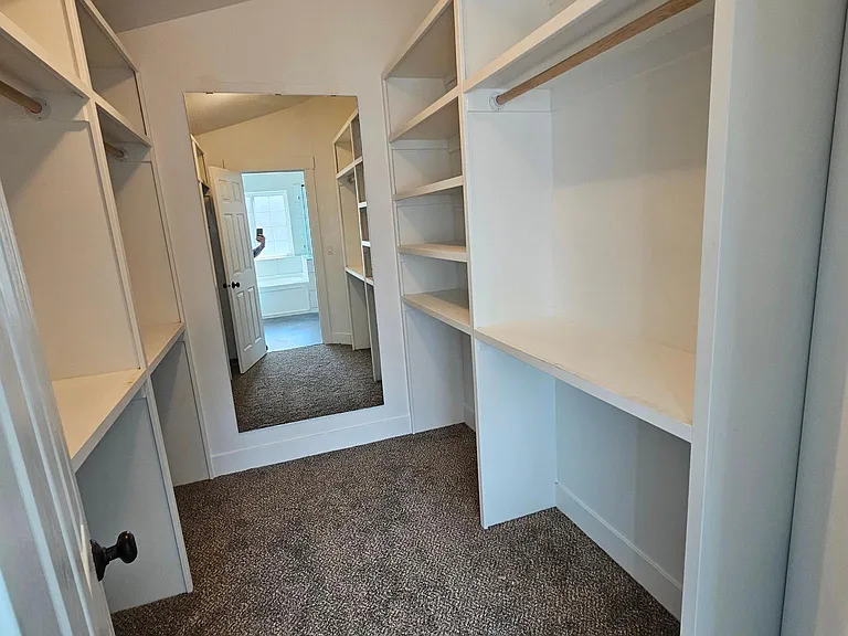 Oversized Walk-in closet with full length mirror