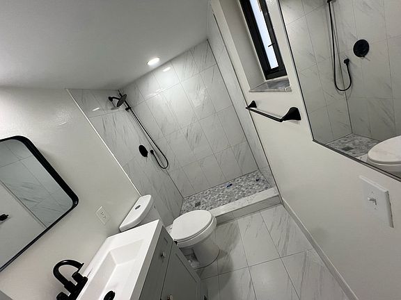 Master bath off the master bedroom, completely remodeled, high impact windows