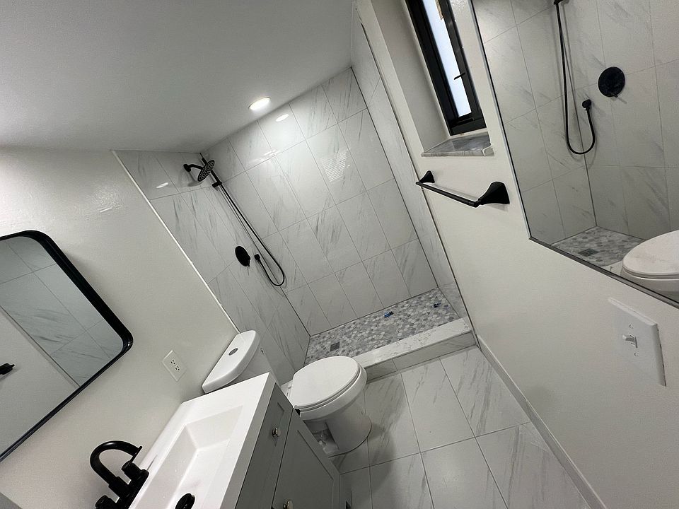 Master bath off the master bedroom, completely remodeled, high impact windows