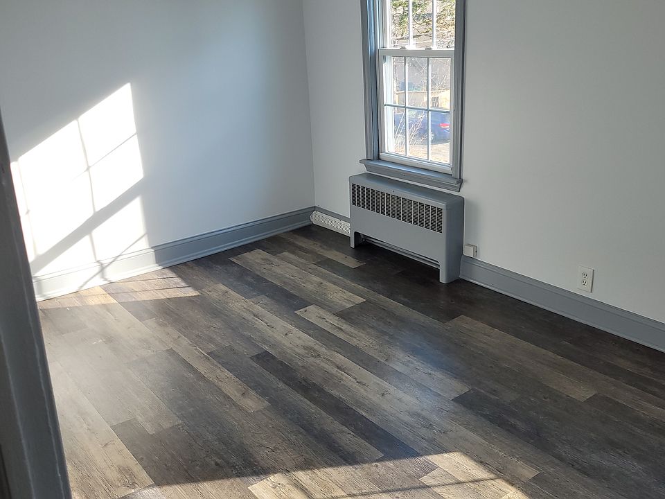 LVP flooring in this bright bedroom.